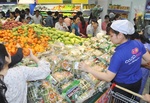 Country’s largest retailer begins to cut prices of Tet goods
