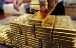 Volatility, year-end demand drive gold prices up