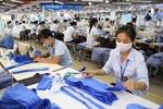 Textile firm sees profit down 1.3%