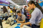 Over 500 firms to take part international textile and garment industry exhibitions in HCM City