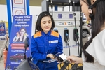 Paying by Visa contactless card at Petrolimex petrol stations