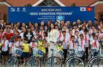 Shinhan Bank gives scholarships, bicycles to underprivileged students in RoK First Lady’s presence
