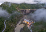 Caged fish at hydroelectric reservoir