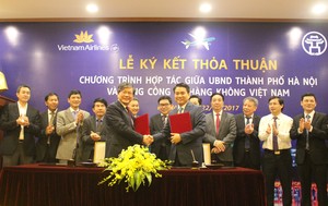 Ha Noi, Vietnam Airlines ink co-operation agreement
