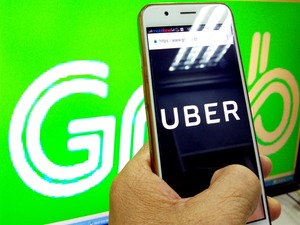 Uber drivers set to work for Grab