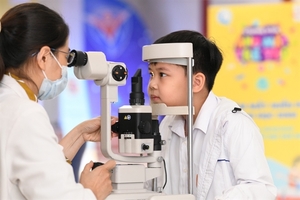 Prudential, National Fund for Vietnamese Children provide eye checks at primary schools