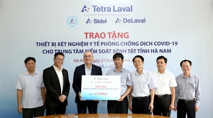 Tetra Laval Group donates medical equipment to Ha Nam Province