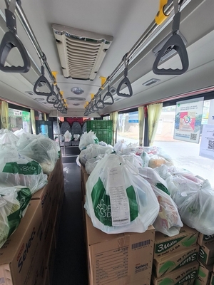 Co.op Food delivers community orders in HCM City by bus