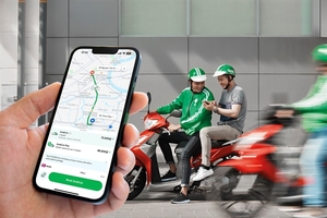 MoMo ties up with Grab for payment